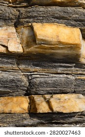 The layers of different rock types visible in the Earth’s crust. A treat for geologists and geology enthusiasts.