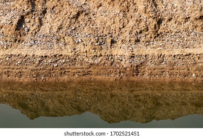 Layers Of Gravel And Silt In Quarry