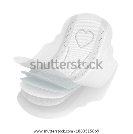 Layers of menstrual pad and feminine hygiene tampon for menstruation cycle, isolated on white background. Feminine hygiene product