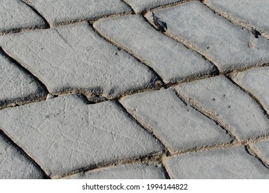 Layers Of Sedimentary Rocks Make Interesting Patterns On The Beach At East Quantoxhead Beach Near Kilve, Somerset, England. Beautiful Old Rocks. Ocean Floor.