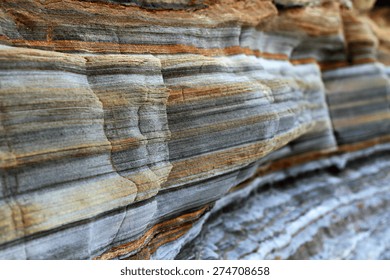 Layers of sedimentary sandstone rock.