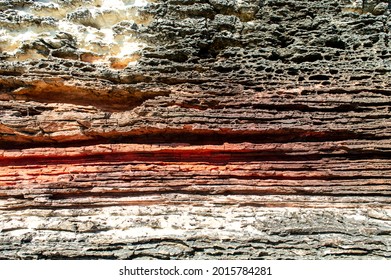Layers of sedimentary sandstone rock. rock formations in red, white and gray. structure background - Shutterstock ID 2015784281