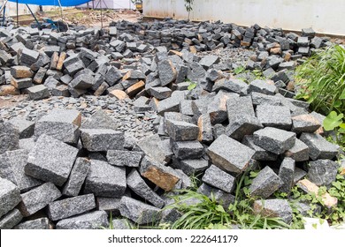 laying of bricks on path way. Bricklayer paving a street. obblestones, pavement construction