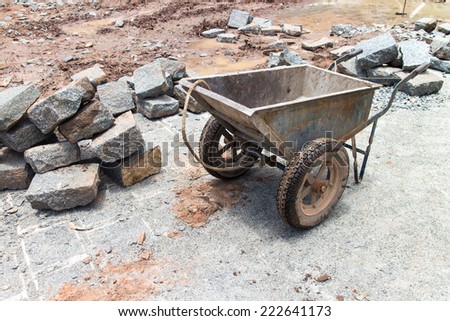 laying of bricks on path way. Bricklayer paving a street. obblestones, pavement construction