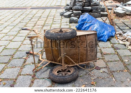 laying of bricks on path way. Bricklayer paving a street. obblestones, pavement construction