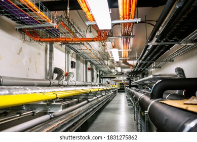 Laying of engineering networks. Ventilation pipes. Air conditioning of buildings. Pipe installation. Technical floor. Maintenance of cable networks.