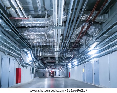Laying of engineering networks. Ventilation pipes. Air conditioning of buildings. Pipe installation. Technical floor. Maintenance of cable networks.