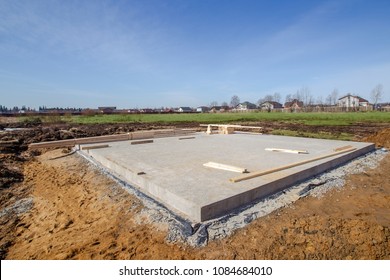 Laying the foundation. Construction works. The foundation for the house. Grounds for the Cottage. - Shutterstock ID 1084684010