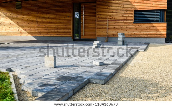 laying slabs on concrete base