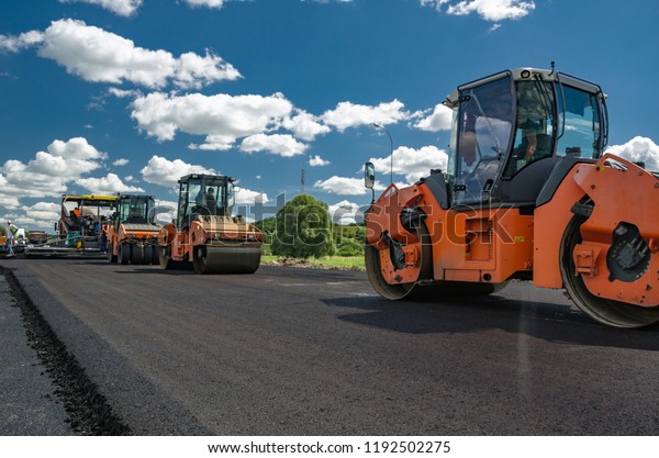 Laying New Asphalt On Road Construction Stock Photo (Edit Now) 1192502275