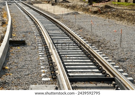 Laying new tram rails on new concrete sleepers with polyurethane pads that reduces vibration and noise emission, as well as isolates the rail