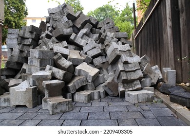 Laying Paving Stones. A Stack Of Cubes.