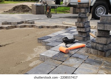 Laying Paving Stones. Paving Works.