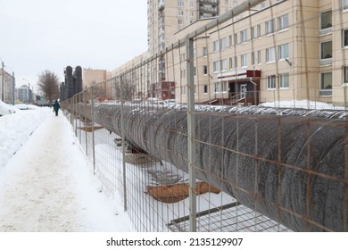 Laying Pipe Heating Network. Repair Work Of Heating Duct. Replacement Pipes Of The Utility Infrastructure. Underground Utility.