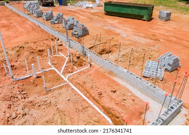 Laying Sewer And Water Pipes Under The Foundation Of A New Residential Construction House An Aerial View