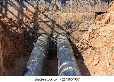 Laying Of Underground Pipes In Concrete Chamber. Installation Of Water Main At The Construction Site. Construction Of Stormwater Pits, Sewerage Valve, Sanitary System And Pump Station