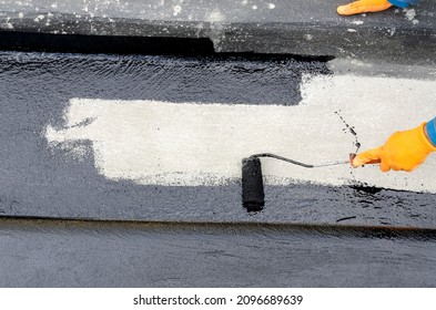 laying of waterproofing sheathing  and insulation during the renovation of a roof in Italy - Shutterstock ID 2096689639