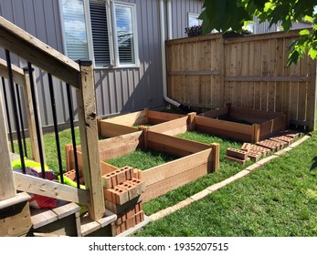 Layout And Construction Of Raised Beds For A Suburban Vegetable Garden. Concept Of Do It Yourself Projects.