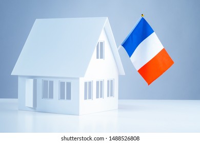 Layout Of The House With The Flag Of France. Buy Timeshare In Paris. Buying Property In France. Accommodation In Paris. Immigration Abroad. Moving To France. Buying A House In Paris.