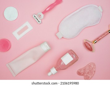 Layout Of Items For Face And Body Care On A Pink Background, Cleansing Gel, Serum, Face Roller, Guasha, Razor, Mask, Cotton Pad, Balm, Wax Strip, Pink, Flat Lay