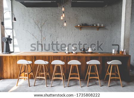 Layout in a loft style in dark colors open space interior view of various coffee Welcome open coffee shop background