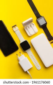 Layout of modern gadgets on a yellow background . Online communication. Internet connection. Mobile communication. 5g. Black and white technology. Modern technologies. Copy space - Shutterstock ID 1961176060