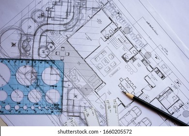 Layout Plan Of Home Landscape Design Or Garden Design Rough Sketching By Hand With Black Pencil, Circle Template Ruler And Scale Ruler On White Paper, With English And Thai Language In Plan Drawing