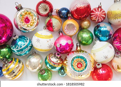 Layout Of Vintage Christmas Baubles On A Plain White Background