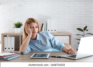 Lazy Employee Wasting Time At Table In Office