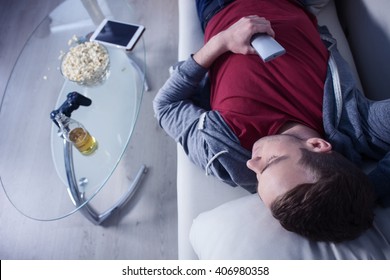 Lazy Guy Is Having A Nap On Couch