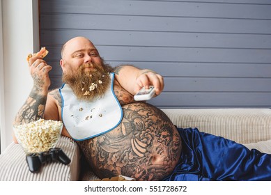 Lazy Thick Guy Watching Tv At Home