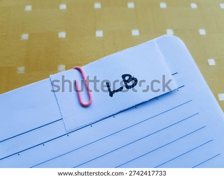 Lb writting on table background. 