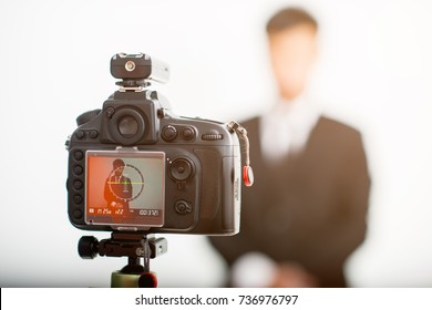 LCD display screen in studio,photograper worker with model businessman
