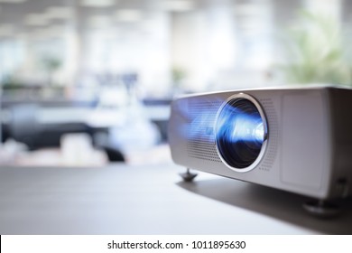 LCD video projector at business conference or lecture in office with copy space