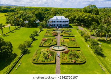 Le Chateau de Bel Ombre Mauritius, an old castle in a tropical garden in Mauritius., a couple on a honeymoon vacation in Mauritius