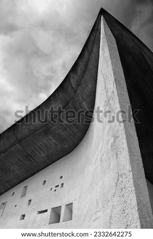 Le Corbusier's Chapelle Notre-Dame du Haut in Ronchamp, France. Architectural masterpiece church that sits on the side of a hill outside of Paris, France.