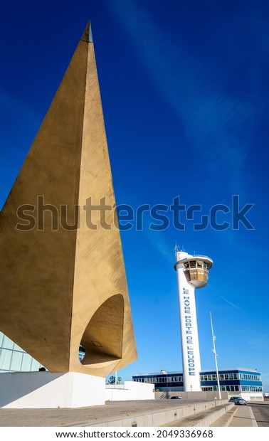 Le Havre, France - June 12, 2021: Control tower\
and harbor master\'s office next to \