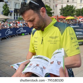 LE MANS, FRANCE - JUNE 11, 2017: Famous English Racer Darren Turner Gives Autograph For Fans During Parade Of Pilots Racing Le Mans