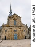 Le Mont Sent Michael, France – August, 31, 2024: Benedictine Abbey of Mont Saint-Michel is a remarkable example of medieval architecture. Abbey church is the highest point of Mont-Saint-Michel.