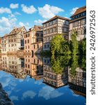 Le Petite France, the most picturesque district of old Strasbourg. Half-timbered houses with reflection in waters of the Ill channels.