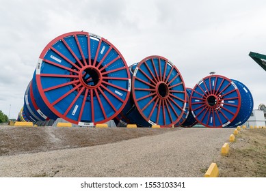Le Trait, Seine-Maritime / France - 13 August 2019: empty subsea umbilical cable reels ready for reloading