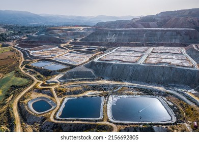 Leaching heaps and storage reservoirs at ore processing plant. Skouriotissa copper mine in Cyprus