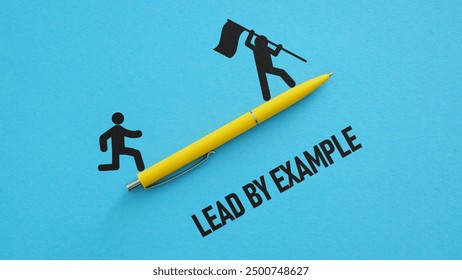 Lead by example is shown as business and motivational concept