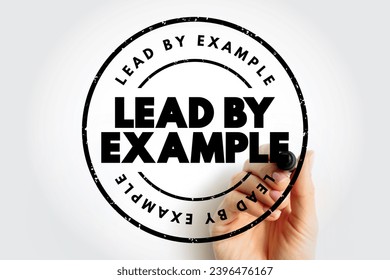Lead By Example text stamp, concept background