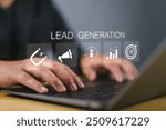 Lead Generation concept. Businessman using laptop with lead generation icon on virtual screen. Finding and identifying customers for business products or services.