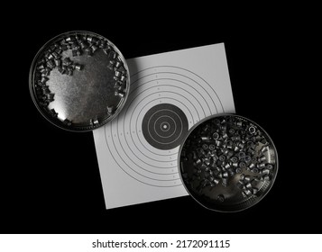 Lead Pellets For Air Rifle, Aluminum Box And Paper Target Isolated On Black  