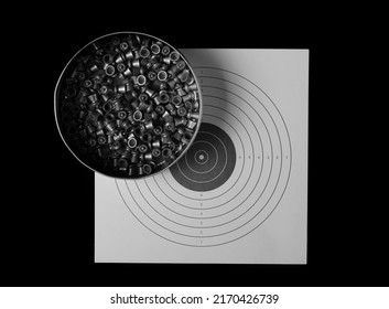 Lead Pellets For Air Rifle, Box And Paper Target Isolated On Black  