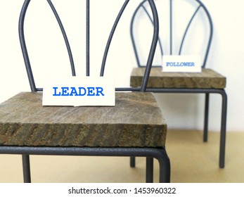 Leader And Follower Concept. Photo Of Two Chairs. One Is Ahead Of Another To Present The Organization Hierarchy 