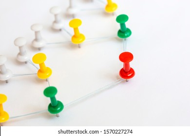 Leader, leadership concept. Red pin with other in connection. ?ommunication chain, team structure. - Shutterstock ID 1570227274