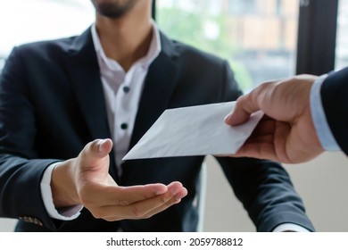 leader manager giving money bonus in paper envelope to business man worker employee for increasing of salary or promotion new position in meeting room office, unemployment, business company concept